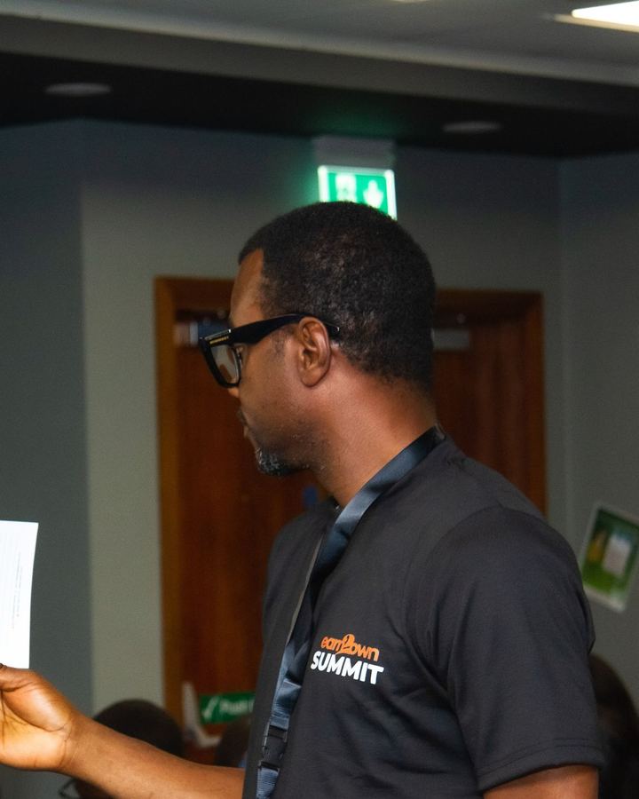 A volunteer at the Earn2Own Summit